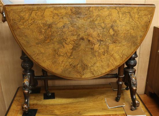 A Victorian burr walnut Sutherland table, W.88cm